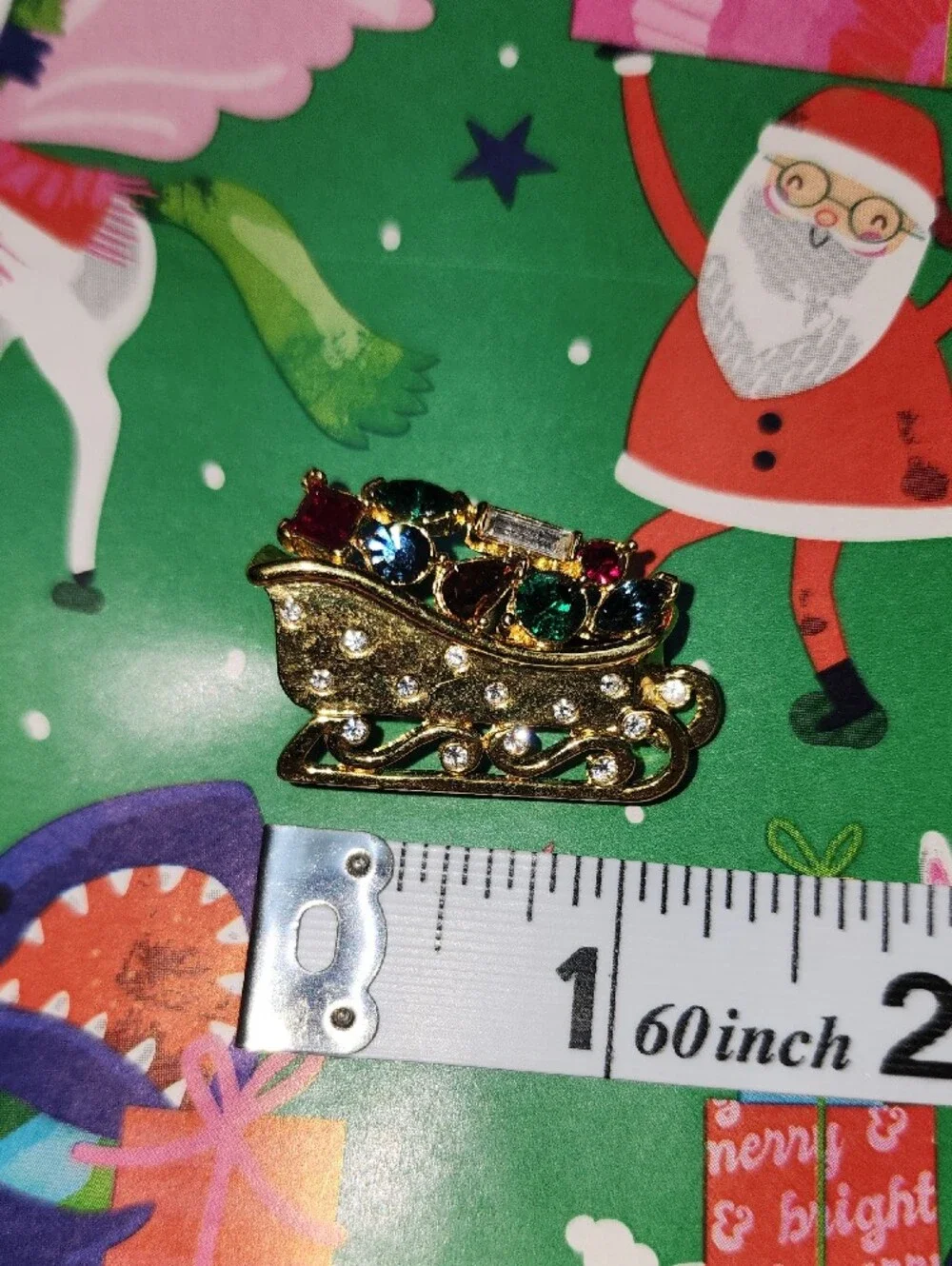 Monet Gold-tone Festive Sleigh Brooch with Multicolor Rhinestones